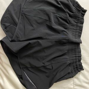 EUC Black HIGH RISE Hotty Hot 4” Size 8